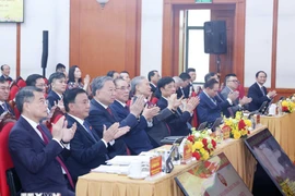 Dirigeants et anciens dirigeants du Parti et de l'Etat lors de l'événement. Photo: VNA