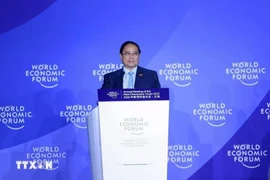Le Premier ministre Pham Minh Chinh prend la parole lors de l'événement. Photo: VNA