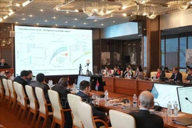 Panorama d'une réunion des représentants des pays membres de l’Institut unifié de recherche nucléaire de Dubna. Photo: VNA