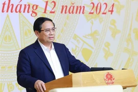 Le Premier ministre Pham Minh Chinh prend la parole lors de l'événement. Photo: VNA