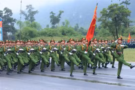 Entraînement des unités de la Police populaire pour le défilé en l'honneur du 80e anniversaire de la Fête nationale. Photo: VNA