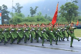 Entraînement des unités de la Police populaire pour le défilé en l'honneur du 80e anniversaire de la Fête nationale. Photo: VNA