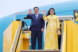 Le Premier ministre Pham Minh Chinh et son épouse. Photo: VNA