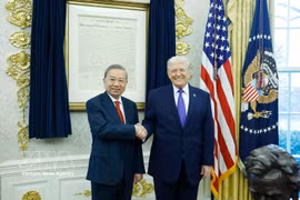 Le secrétaire général du Parti communiste du Vietnam, To Lam, et le président américain Donald Trump. Photo : VNA