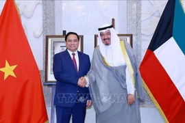 Le Premier ministre Pham Minh Chinh et son homologue koweïtien, Cheikh Ahmad Al-Abdullah Al-Sabah. Photo: VNA