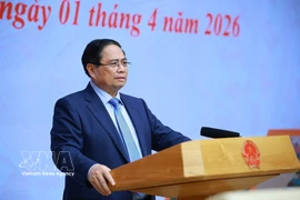 Le Premier ministre Pham Minh Chinh lors de la conférence. Photo: VNA