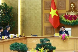 Le Premier ministre Pham Minh Chinh reçoit Chen Gang, membre du Comité central du Parti communiste chinois (PCC), secrétaire du Comité du PCC et président du Comité permanent de l'Assemblée populaire de la région autonome Zhuang du Guangxi, Chine. Photo: VNA