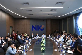 Des responsables du ministère des Finances, du ministère des Sciences et des Technologies, des représentants d'instituts de recherche et d'universités, ainsi que près de 70 experts de 22 pays, participent à l'événement. Photo : NIC