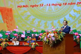 Pham Minh Chinh, membre du Bureau politique, secrétaire du Comité du Parti et Premier ministre, prononce le discours de clôture du Congrès. Photo : VNA