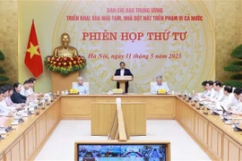 Le Premier ministre Pham Minh Chinh prend la parole lors de la réunion. Photo: VNA