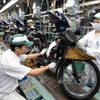 Une chaîne de production de moto de l'usine Honda Phuc Yên, dans la province de Vinh Phuc. Photo: VNA