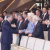 Le secrétaire général du Parti, Tô Lâm, et les délégués présents à l’événement, à Hanoi, le 8 août. Photo : VNA