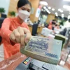 Depuis le début de l’année, les banques ont réduit leurs taux d’intérêt afin d’aider les entreprises à accéder aux capitaux. Photo : tinnhanhchungkhoan.vn