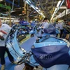 Une chaîne de production de Piaggio Vietnam. Photo: VNA