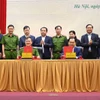 Vue de la cérémonie de signature du protocole d’accord entre le ministère de l’Agriculture et de l’Environnement et le ministère de la Sécurité publique. Photo : VNA
