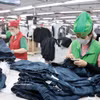 Le secteur du textile et de l'habillement au Vietnam reste un pilier majeur de l'économie nationale, avec des exportations s'élevant à près de 19 milliards de dollars au premier semestre de 2026. Photo : VNA