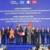 Le vice-Premier ministre Hô Duc Phoc et le commissaire européen aux Partenariats internationaux, Jozef Síkela, assistent à la cérémonie de signature de l'accord de prêt entre l'Agence française de développement (AFD) et le groupe EVN pour le projet de centrale hydroélectrique à accumulation par pompage de Bac Ai. Photo : VNA