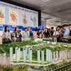 L'exposition sur le Plan directeur de la capitale à l’horizon de 100 ans attire les foules. Photo: VNA