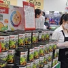 Raisins secs américains en conserve sur les rayons du MM Mega Market An Phu, Hô Chi Minh-Ville. Photo d'archive: nld.com.vn