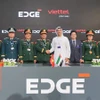 Présence des responsables du groupe Viettel et du groupe émirati EDGE à la cérémonie de signature du protocole d’accord. Photo : VNA