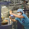 Les entreprises du textile s'engagent dans la transformation verte, répondant aux normes élevées du marché. Photo: VietnamPlus