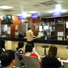 Au Bureau d'enregistrement des entreprises du Département du plan et de l'investissement de Hanoi. Photo : VNA