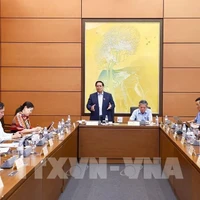 Le Premier ministre Pham Minh Chinh lors des discussions en groupes dans le cadre de la 9e session de l’Assemblée nationale, le 23 mai. Photo: VNA