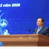 Le Premier ministre Pham Minh Chinh au IIIᵉ Forum national sur le développement de l’économie et de la société numériques, organisé en présentiel et en ligne avec les 34 villes et provinces. Photo : VNA