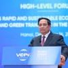 Le Premier ministre Pham Minh Chinh prend la parole lors du Forum économique du Vietnam 2025, perspectives 2026. Photo : VNA