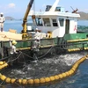 Modèle d'aquaculture marine industrielle dans la baie de Van Phong, district de Van Ninh (aujourd'hui commune de Van Ninh), province de Khanh Hoa. Photo : VNA