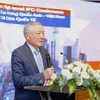Le vice-Premier ministre permanent Nguyên Hoa Binh prend la parole lors de la conférence. Photo : VNA