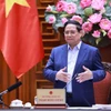 Le Premier ministre Pham Minh Chinh préside la réunion. Photo : VNA