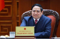 Le Premier ministre Pham Minh Chinh s'exprime lors de la réunion. Photo: VNA