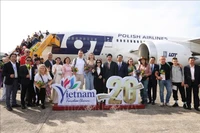 Le 15 décembre, une cérémonie officielle a été organisée à l’aéroport international de Phu Quôc pour célébrer l’arrivée du 20e millionième visiteur international. Photo: VNA