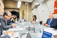 La rencontre entre les deux parties. Photo: VNA