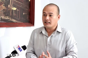 Thong Mengdavid, analyste en géopolitique et affaires internationales à l’Institut des études internationales et des politiques publiques (IISPP) de l’Université royale de Phnom Penh (RUPP). Photo: VNA