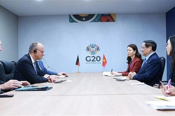 Rencontre entre le Premier ministre Pham Minh Chinh et le chancelier allemand Friedrich Merz. Photo: VNA