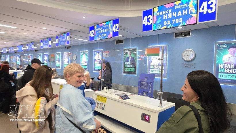 Les premiers passagers du vol Minsk–Nha Trang. Photo: VNA