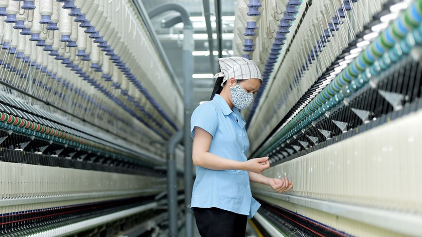 Les experts de l'UOB estiment que l'économie vietnamienne fait toujours preuve de résilience et de dynamisme. Photo : VietnamPlus