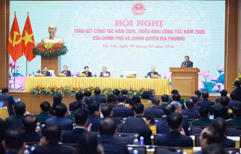 Le Premier ministre Pham Minh Chinh s'exprime lors de la conférence. Photo: VNA