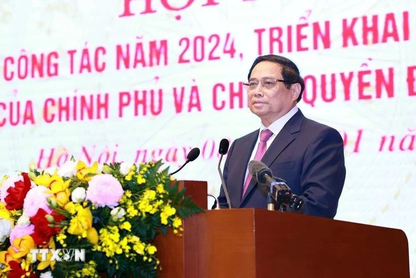 Le Premier ministre Pham Minh Chinh prend la parole lors de la conférence. Photo: VNA