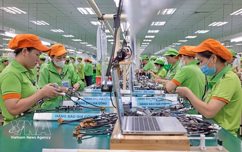 Chaîne d’assemblage des produits après transformation dans l’usine de Bandai Vietnam. Photo : VNA