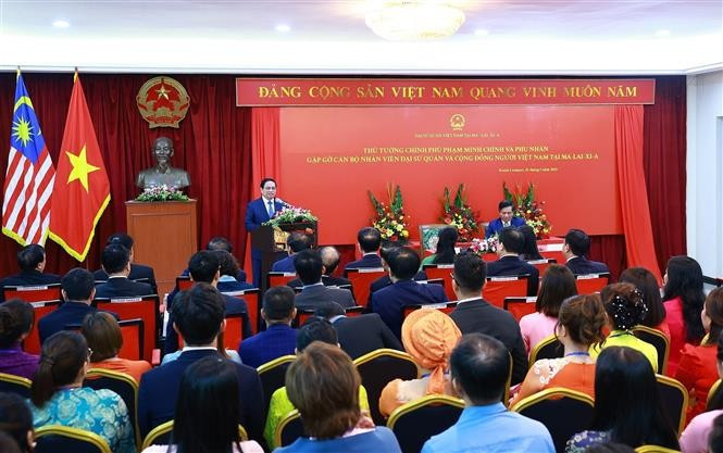 Le Premier ministre Pham Minh Chinh rencontre la communauté vietnamienne en Malaisie. Photo: VNA
