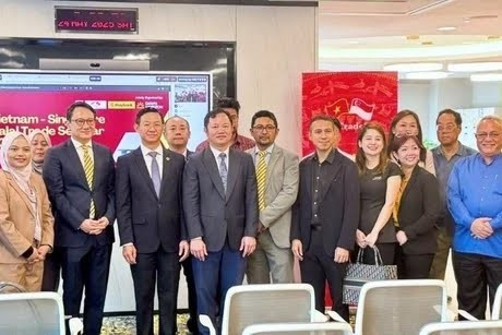 Des délégués participent à un séminaire commercial sur les produits Halal entre le Vietnam et Singapour. Photo: VNA