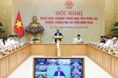 Le Premier ministre Pham Minh Chinh préside une conférence nationale sur le Programme cible national de prévention et de lutte contre les drogues à l’horizon 2030. Photo: VNA
