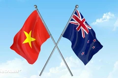 Drapeaux du Vietnam et de la Nouvelle-Zélande. Photo : VNA