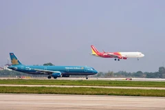 Avions au décollage à l'aéroport international de Nôi Bài. Photo: qdnd.vn