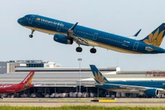Un avion de Vietnam Airlines au décollage à l'aéroport international de Nôi Bài, à Hanoi Photo: VNA