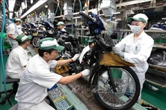 Une chaîne de production de moto de l'usine Honda Phuc Yên, dans la province de Vinh Phuc. Photo: VNA