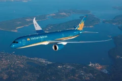 Un avion de Vietnam Airlines en vol. Photo: VNA